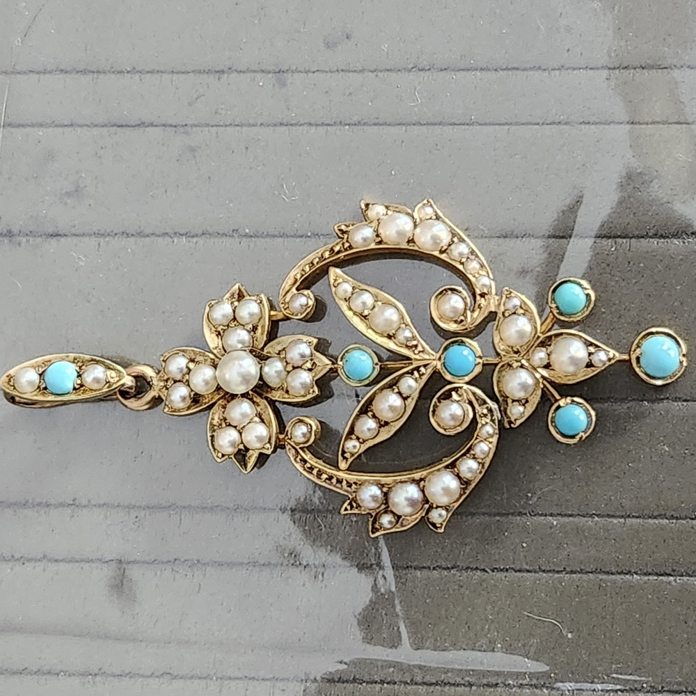 Elegant Gold and Turquoise Pendant